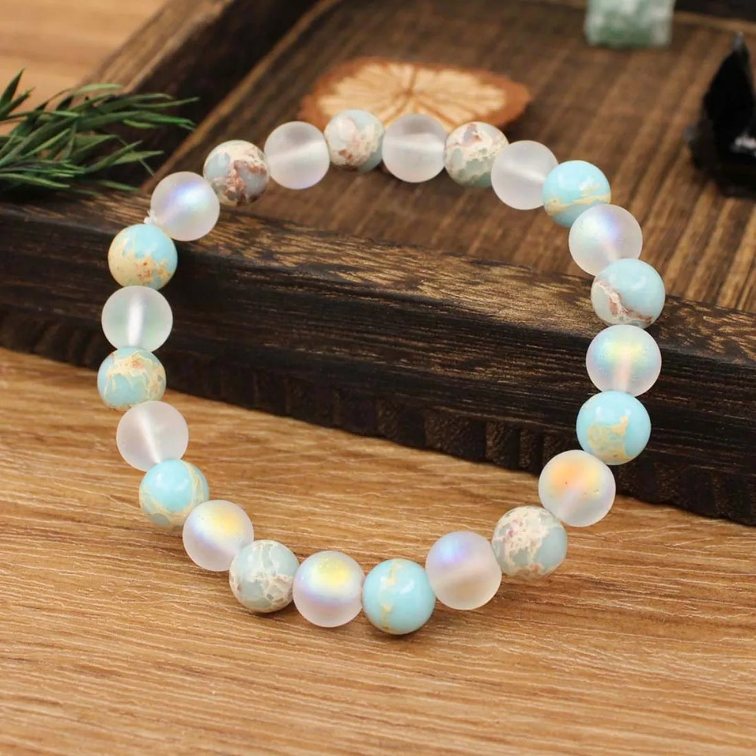1 Piece Aura Quartz and Ocean Sediment Beaded Bracelet - Unisex - Homeopathic Crystal Jewelry - Brings Abundance - Prosperity